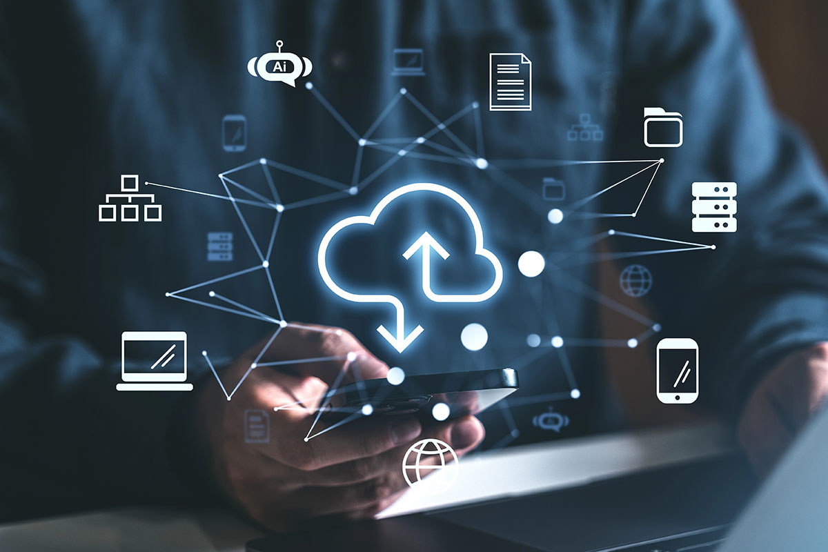 A person holding a smartphone with digital icons representing cloud computing, data transfer, and technology surrounding them.